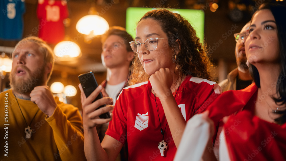 Excited Female Holding a Smartphone, Nervous About the Sports Bet She Put on a Her Favorite Soccer Team. Ecstatic Emotions When Football Team Scores a Goal and She Wins a High Stakes Lottery Prize.