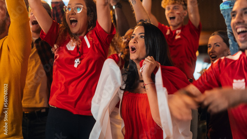 Close Up Portraits of a Diverse Group of Supportive Soccer Fans with Painted Faces Standing in a Bar, Cheering for Their Team. Raising Hands and Shouting. Friends Celebrate Victory After the Goal.