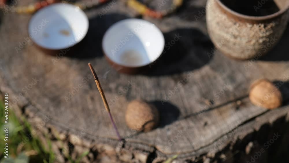 incense stick smokes beautifully outdoors. traditional Chinese tea ceremony incense stick smokes beautifully outdoors. traditional Chinese tea ceremony
