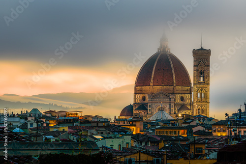 The illuminated Florence Cathedral in a misty sunrise early morning.