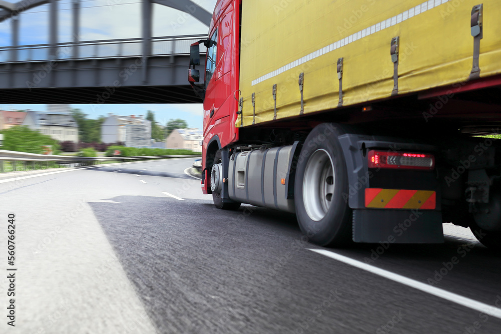 Naklejka premium A fast truck running on the highway 
