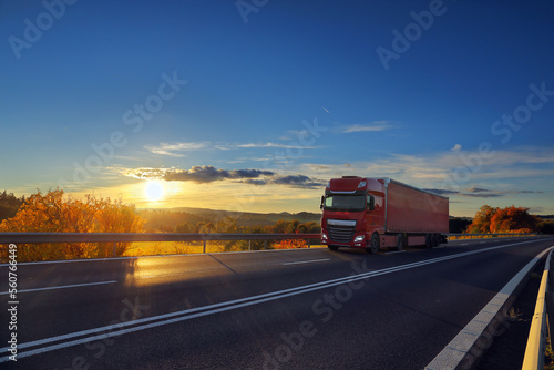 Truck transport on the road at sunset and cargo © Jaroslav Pachý Sr.