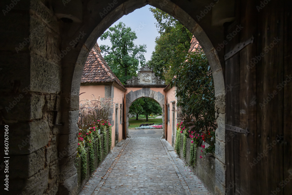 View through the Burgtor city gate on the gardens in the medieval German town of Rothenburg ob der Tauber.