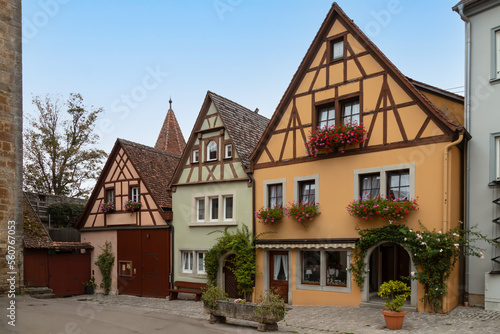 Picturesque little colored half-timbered houses in the medieval town of Rothenburg ob der Tauber.