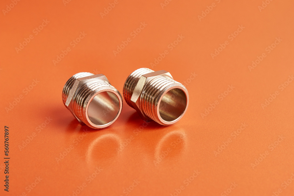 Double nipple with an external thread for connecting pipeline elements. Plumbing and heating. Double nipple with an external thread for connecting pipeline elements. Plumbing and heating.