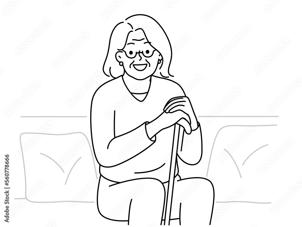 Smiling elderly grandmother sit on sofa 