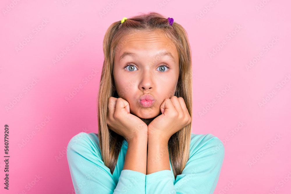 Closeup photo of young cute pretty schoolgirl pouted lips touch cheeks look you dreamy interested concentrated isolated on bright pink color background Closeup photo of young cute pretty schoolgirl pouted lips touch cheeks look you dreamy interested concentrated isolated on bright pink color background