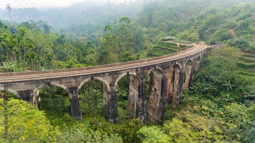 Aerial view of famous Nine Arches Bridge of Sri Lankan railway. The surrounding area has seen a steady increase of tourism due to the bridge's architectural ingenuity.