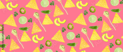 Tasty nachos with limes, avocados, jalapeno peppers, cilantro and guacamole sauce on pink background