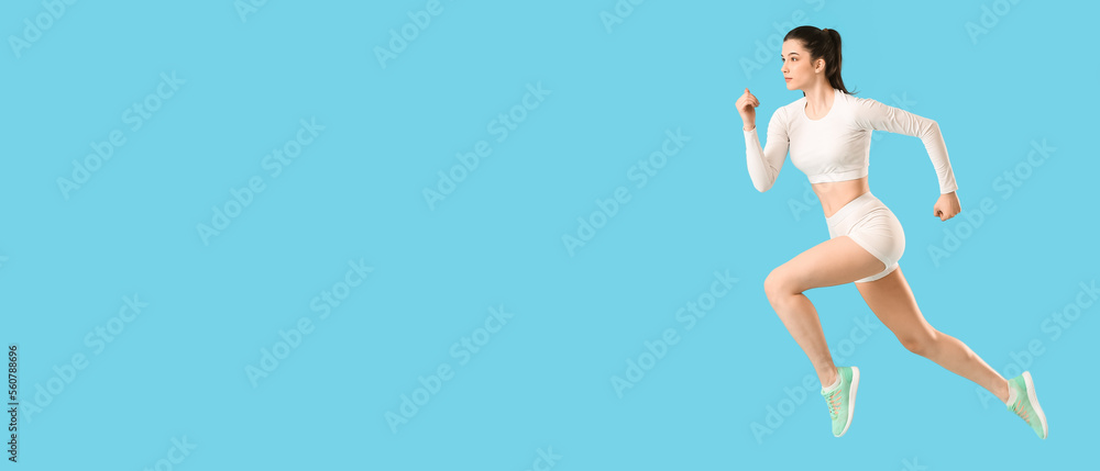 Sporty running woman on light blue background with space for text