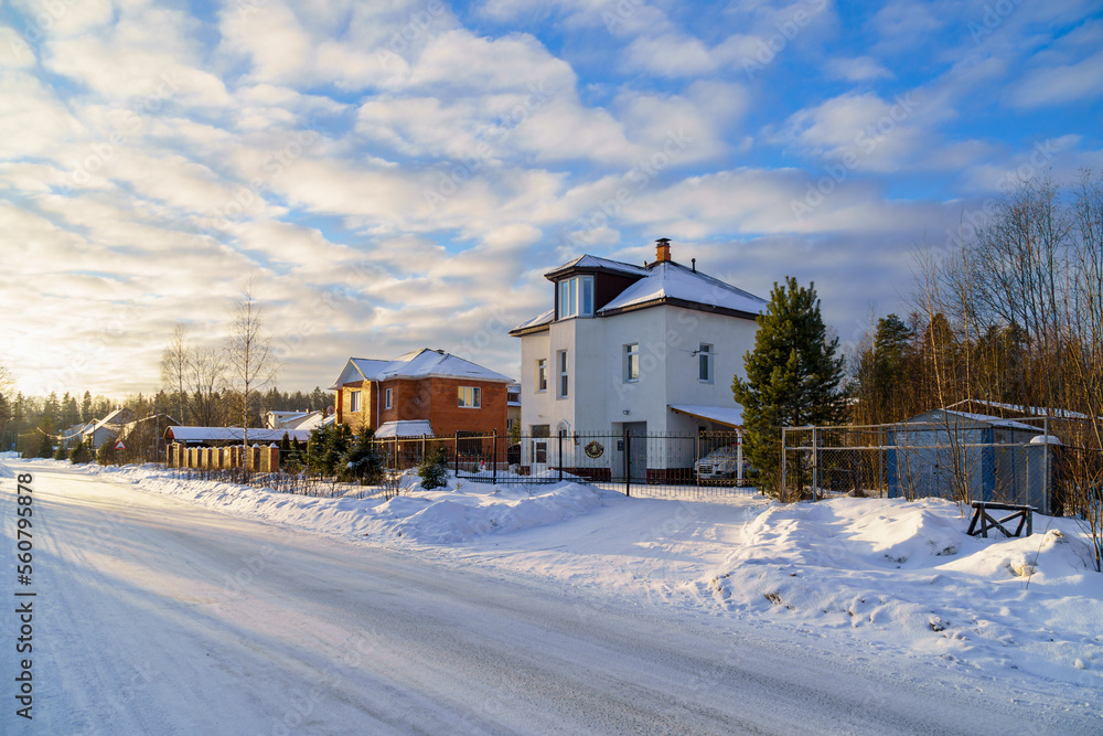 Short sunny day in winter in calm urban neighborhood of low buildings Short sunny day in winter in calm urban neighborhood of low buildings