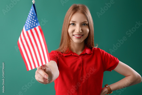 Young redhead woman with US...