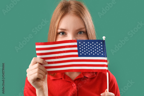 Young redhead woman with US...