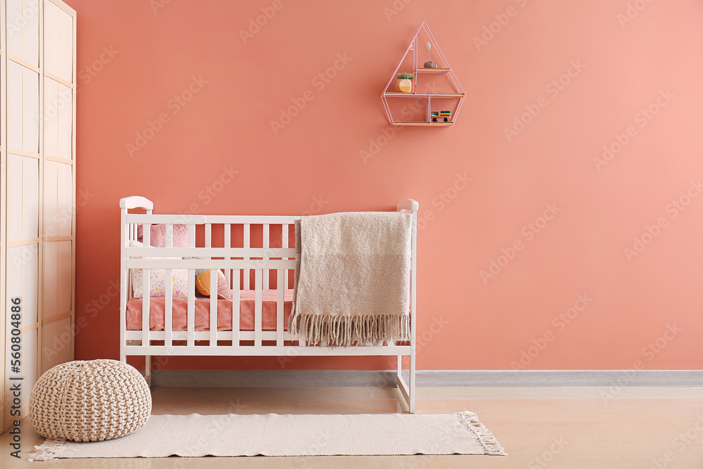 Stylish interior of children's room with baby bed Stylish interior of children's room with baby bed
