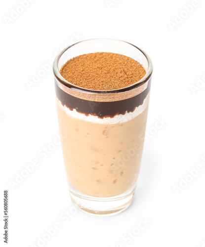 Shot of delicious pudding with chocolate and cinnamon isolated on white background