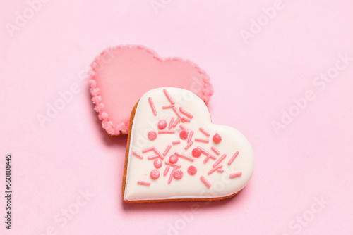 Delicious heart shaped cookies on pink background. Valentine's Day celebration