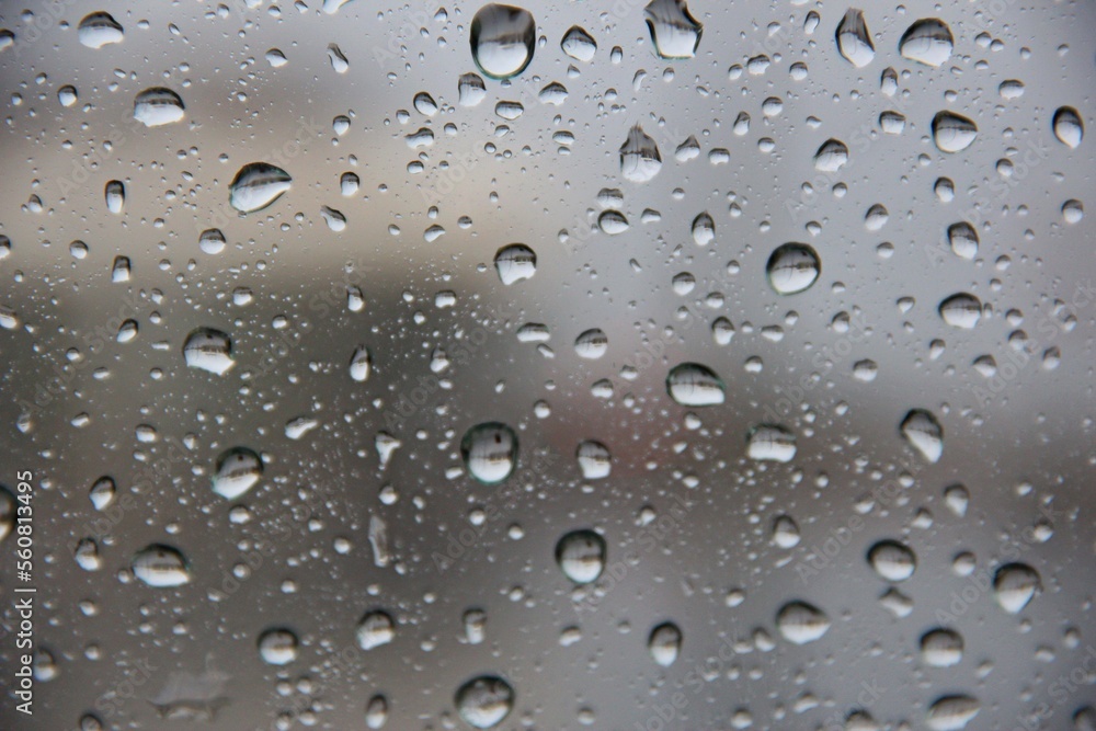 drops of water on a glass window drops of water on a glass window