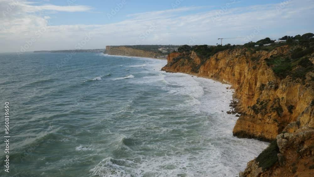 Athlantic Ocean waves in Portugal breacking agains the rocks and cliffs (Arrifes, South Portugal) Athlantic Ocean waves in Portugal breacking agains the rocks and cliffs (Arrifes, South Portugal)