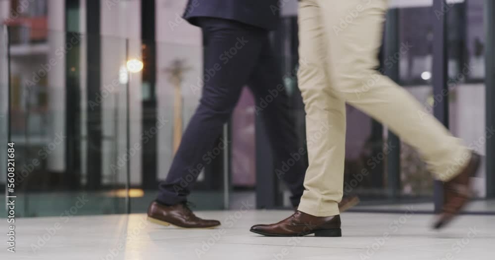 Feet, crowd and business people walking in an office at work as a busy corporate employee group. Zoom, legs and shoes with professional workers on a walk while working as colleagues or coworkers Feet, crowd and business people walking in an office at work as a busy corporate employee group. Zoom, legs and shoes with professional workers on a walk while working as colleagues or coworkers