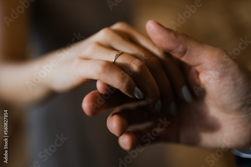 close-up of the hands of a couple in love with a ring on the ring finger, marriage proposal
