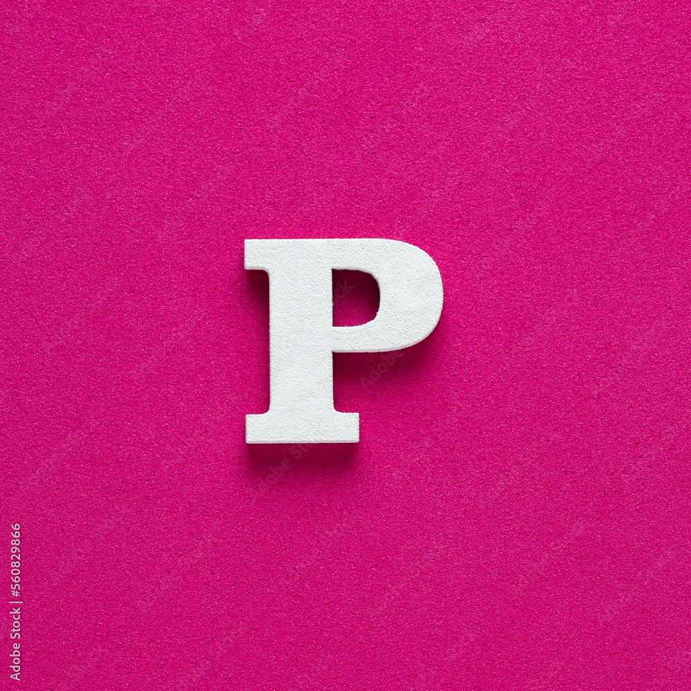 Alphabet letter P - White wooden letter on rhodamine red background Alphabet letter P - White wooden letter on rhodamine red background