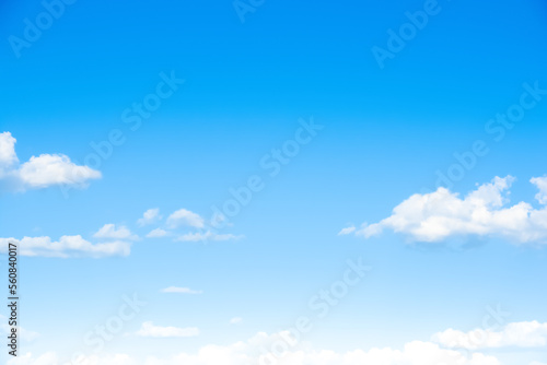 Blue sky with fluffy soft clouds