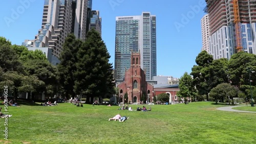 Tilt Down Shot Of Yerba Buena Gardens Against Buildings During Sunny Day - San Francisco, California photo