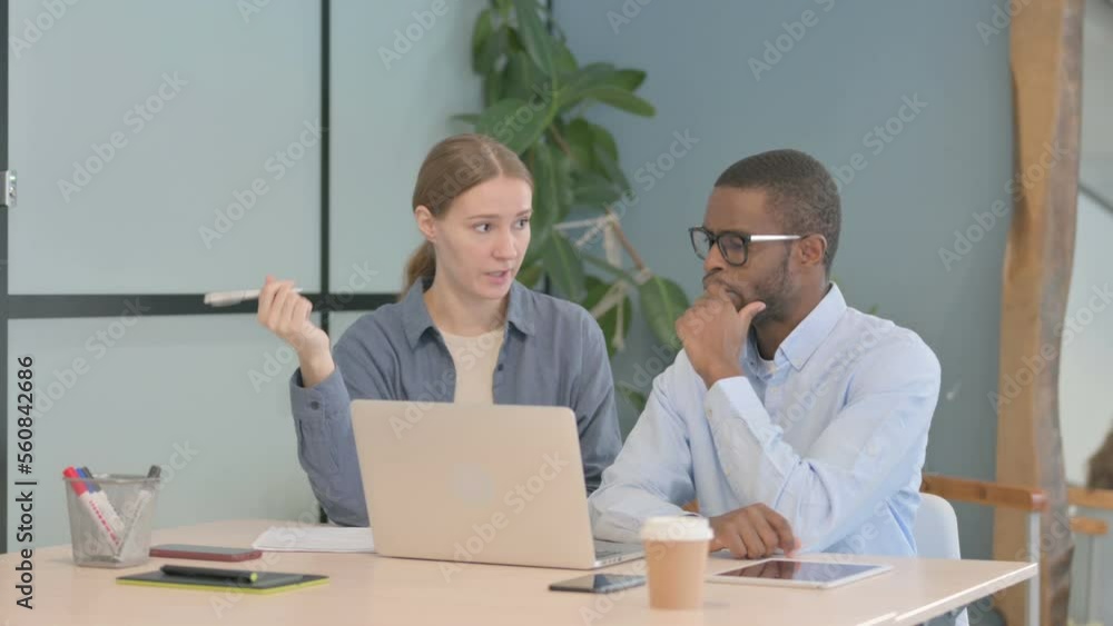 Caucasian Businesswoman Talking with African Businessman Caucasian Businesswoman Talking with African Businessman