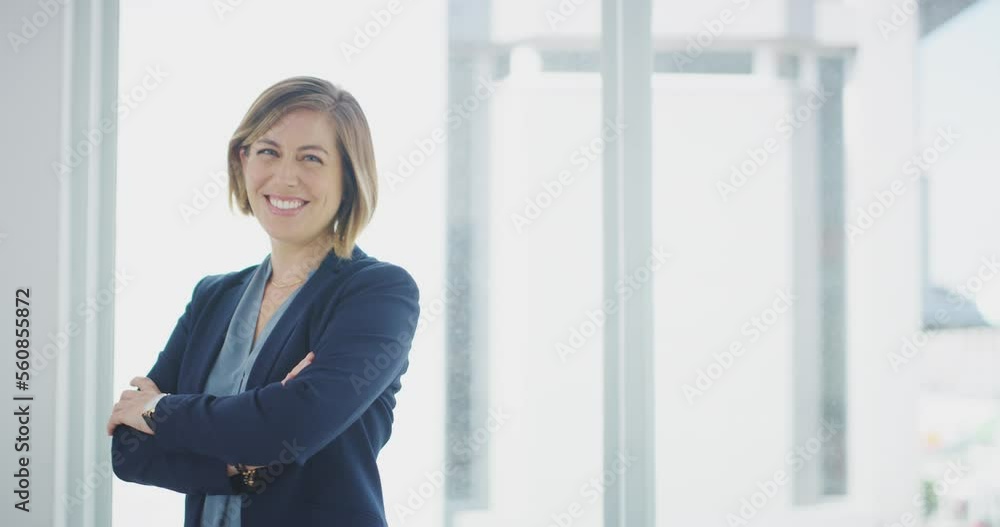 Smile, face and business woman by office window for Human Resources, company leadership and success. Proud professional, corporate worker or employee in workplace portrait, career mission and vision Smile, face and business woman by office window for Human Resources, company leadership and success. Proud professional, corporate worker or employee in workplace portrait, career mission and vision