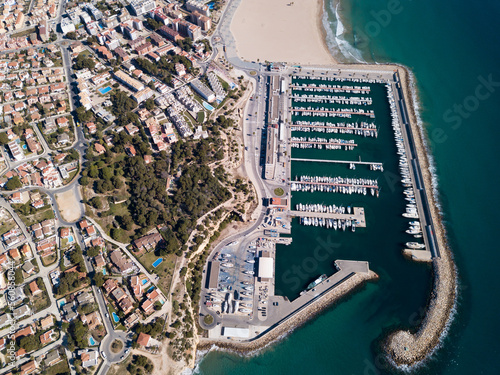 Overview of yachts in marina near small tourist town of Torredembarra on Costa Daurada, Catalonia, Spain
