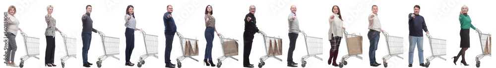 a group of people with a shopping cart point their finger at the camera a group of people with a shopping cart point their finger at the camera