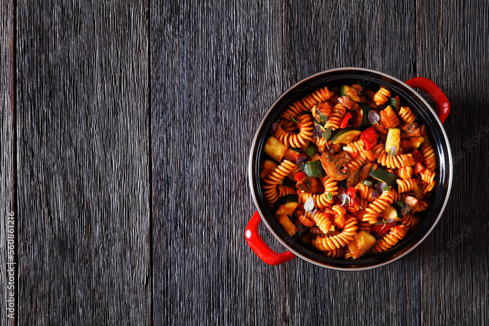 Vegetable with Pasta in red pot, top view Vegetable with Pasta in red pot, top view