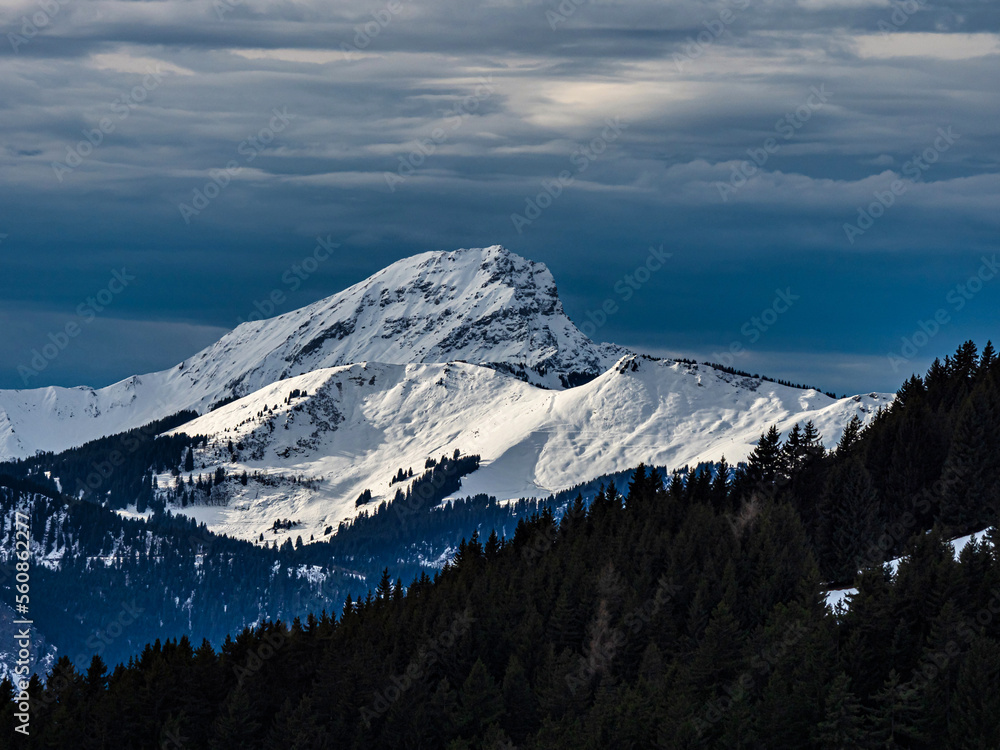 Swiss Alps winter landscape with snow and sun, mountains in Europe