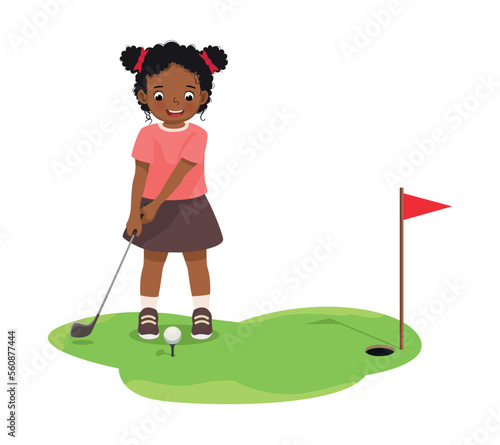 Cute little African girl playing golf ready to hit ball aiming at the hole
