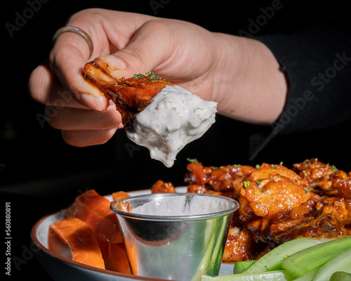 Delicious bbq style wings served with ranch dressing