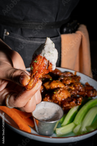 Delicious bbq style wings served with ranch dressing