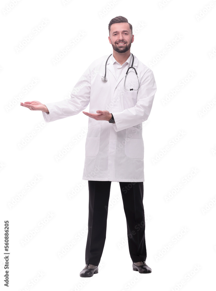 in full growth. smiling therapist doctor pointing to copy space in full growth. smiling therapist doctor pointing to copy space