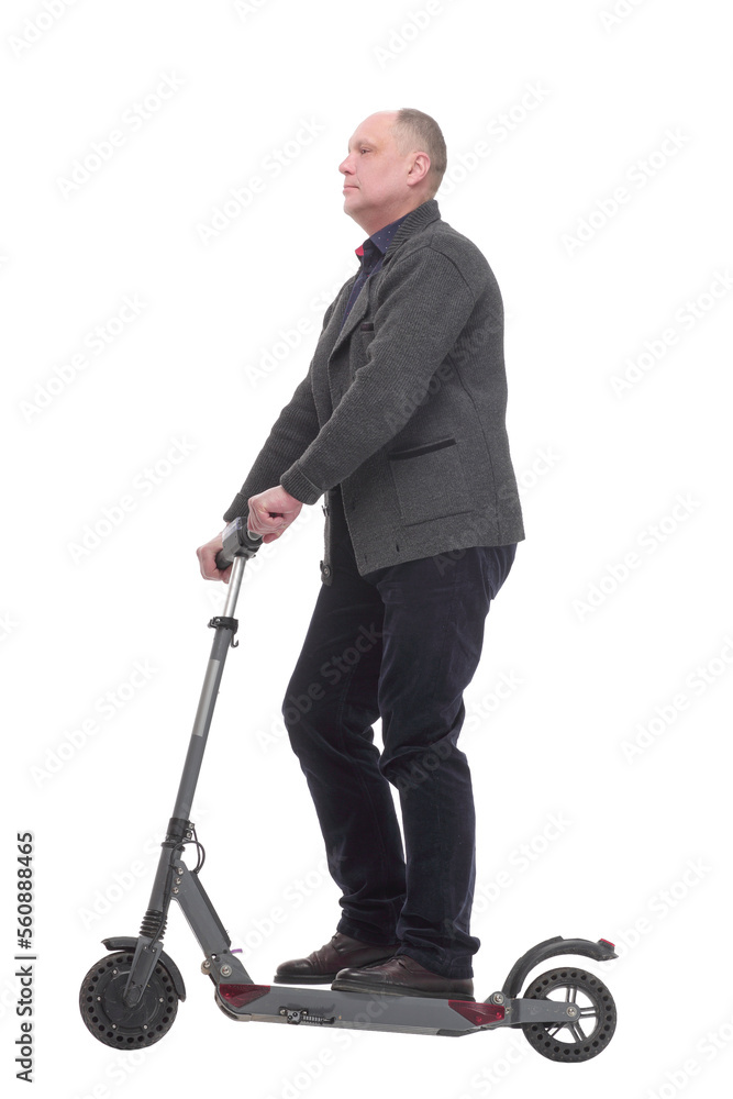happy casual man with electric scooter .isolated on a white background. happy casual man with electric scooter .isolated on a white background.