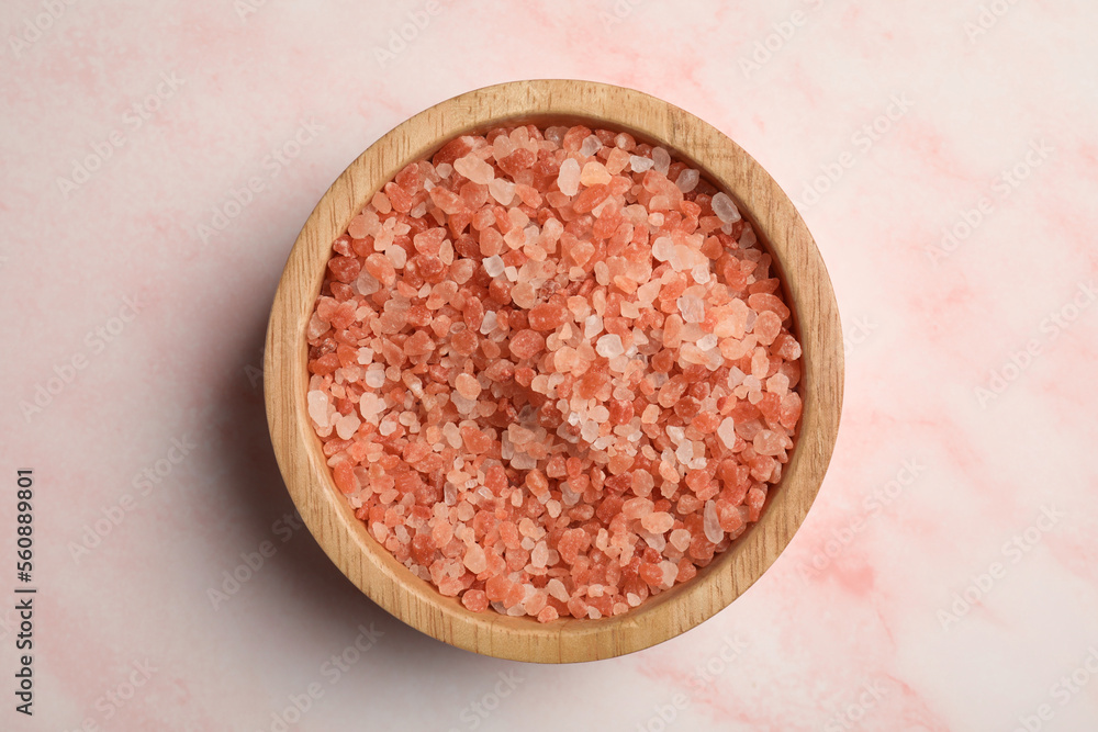 Aromatic sea salt on pink marble table, top view Aromatic sea salt on pink marble table, top view