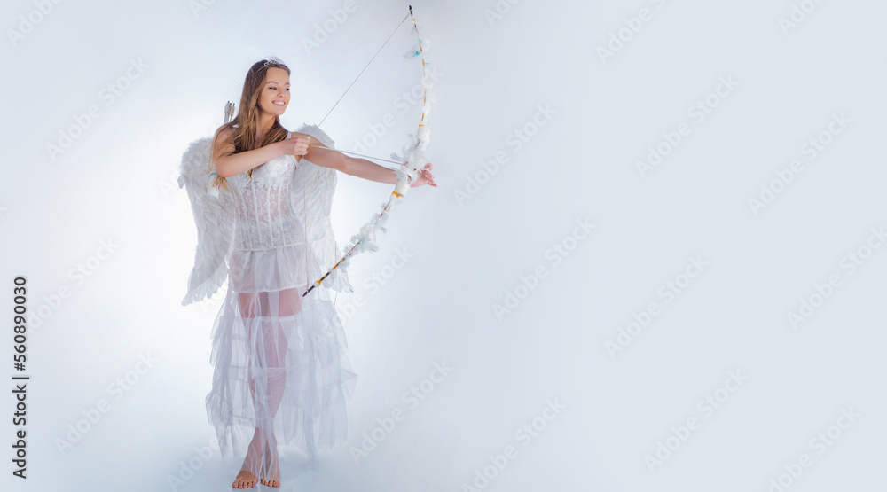 Valentines day banner with sexy angel woman. Pretty white little girl as the cupid with a bow and arrow congratulating on St Valentines day. Valentines day banner with sexy angel woman. Pretty white little girl as the cupid with a bow and arrow congratulating on St Valentines day.