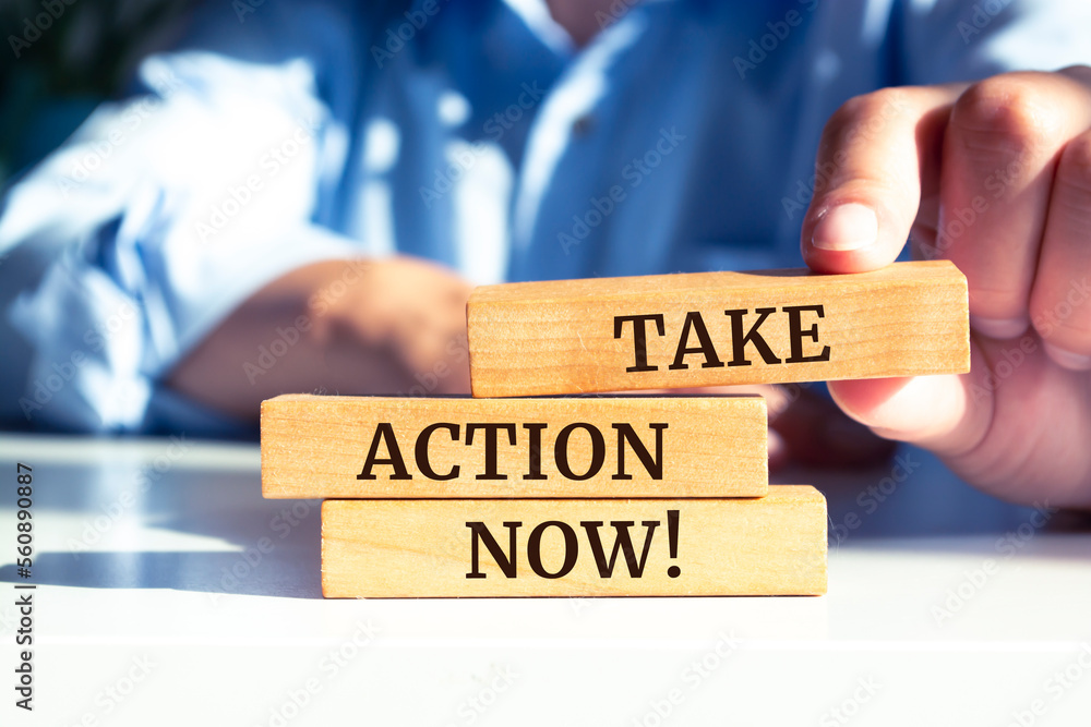 Closeup on businessman holding a wooden block with Closeup on businessman holding a wooden block with