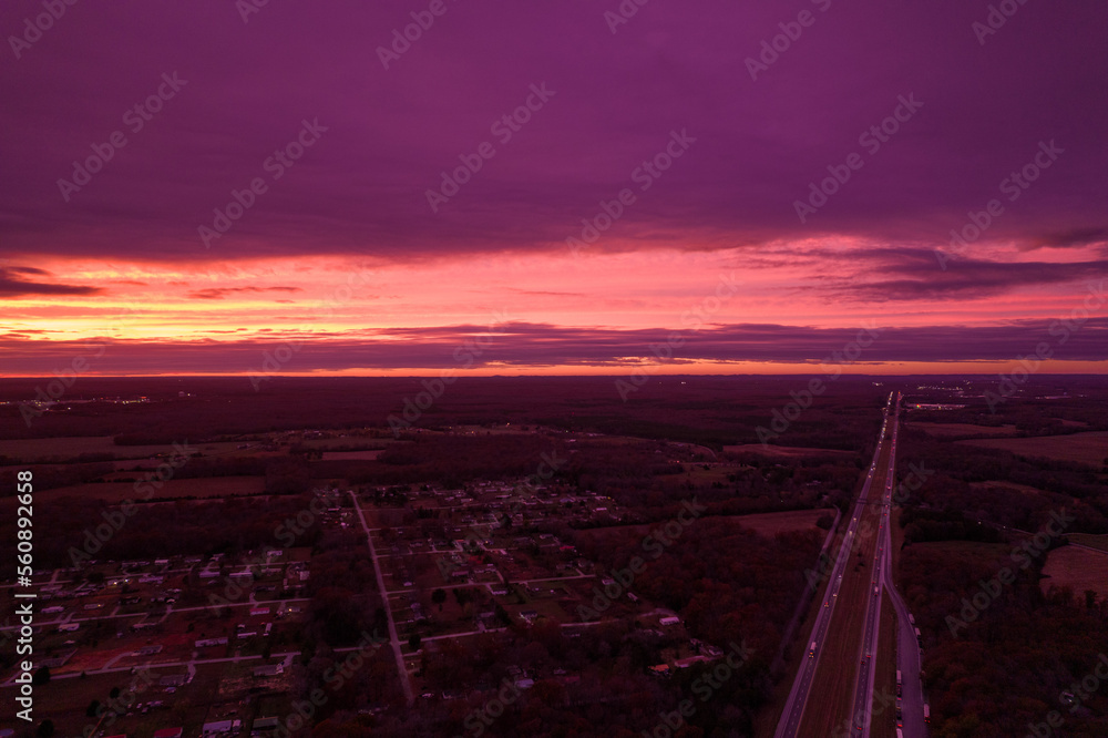 Red sunset in Illionois look from drone. Aerial view of red sunset in the USA