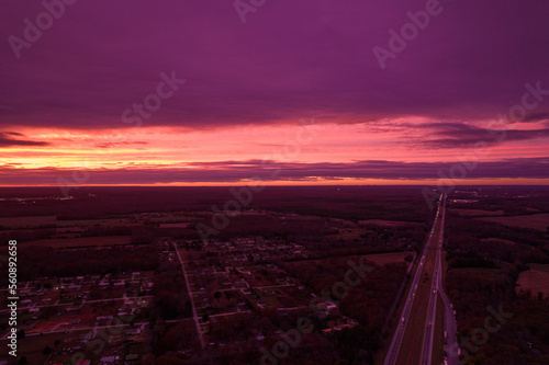 Red sunset in Illionois look from drone. Aerial view of red sunset in the USA