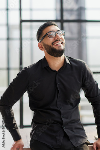 portrait of a young businessman who is smiling © Katsiaryna