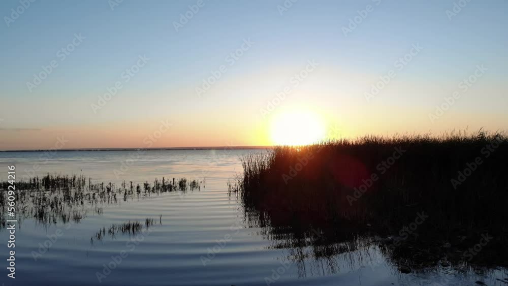 Golden Sunrise With Mirror Reflection On A Calm Lake. Aerial Drone Shot Golden Sunrise With Mirror Reflection On A Calm Lake. Aerial Drone Shot
