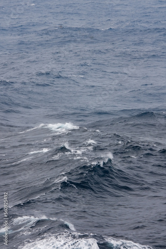 Stormy sea conditions with high swell waves on Atlantic Ocean during transatlantic passage crossing on ocean liner © Tamme
