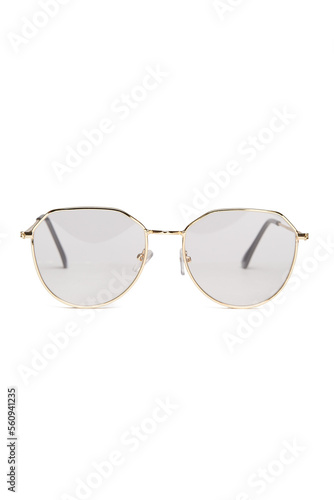 Close-up shot of fashion glasses with clear lenses in a gold metal frame. Fashion glasses are isolated on a white background. Front view.
