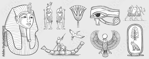 Eye of Horus, Tutankhamun’s pharaoh mask, stork, palm, owl, cartouche, fisherman on papyrus boat, warriors, Horus falcon, Amun Ra, Anubis. photo