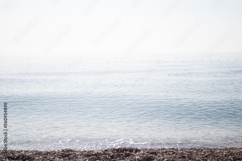 Seascape with pebble stone beach sea landscape coast