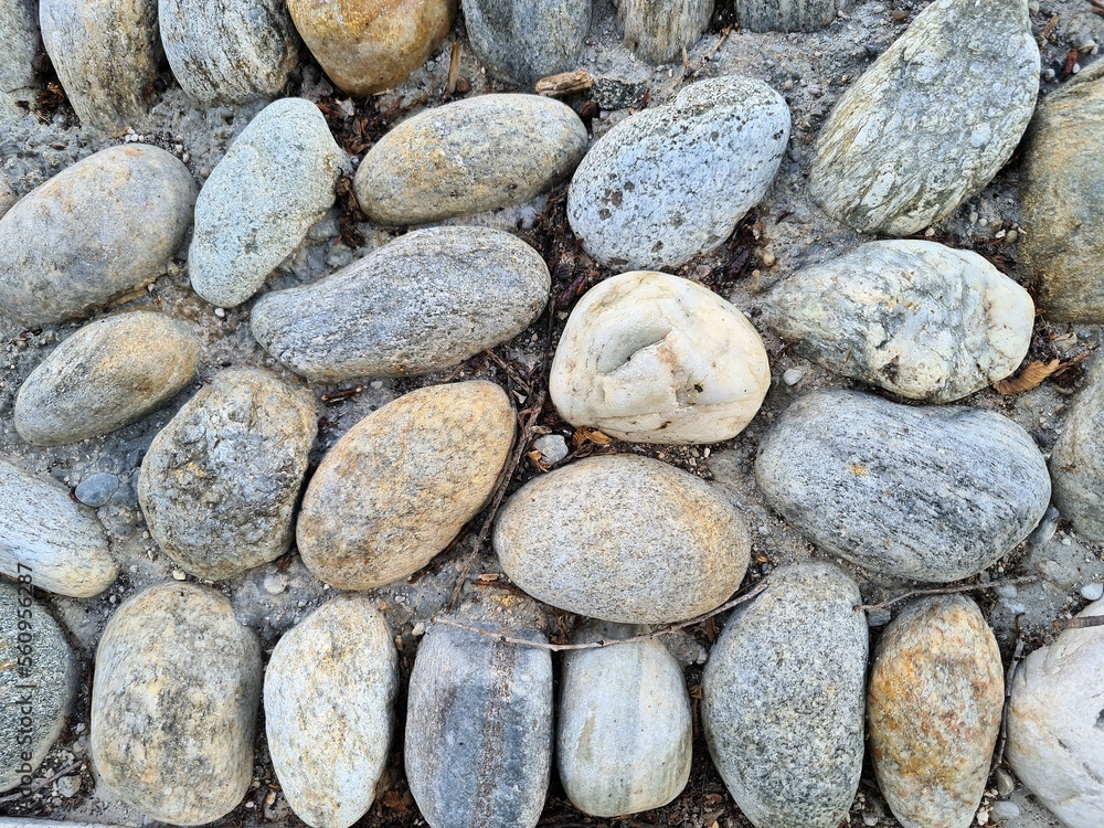evocative texture image of pebbles at the beach evocative texture image of pebbles at the beach